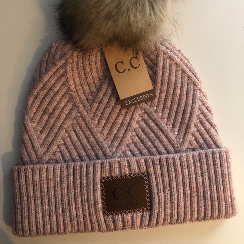 Beanie hat with puff ball